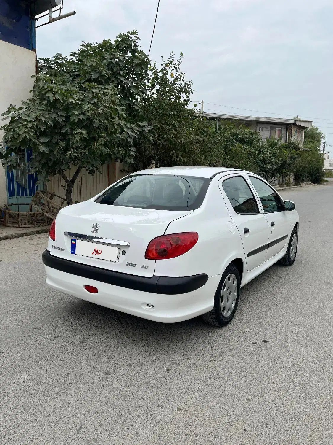 پژو ۲۰۶ صندوق دار v8 - 1395