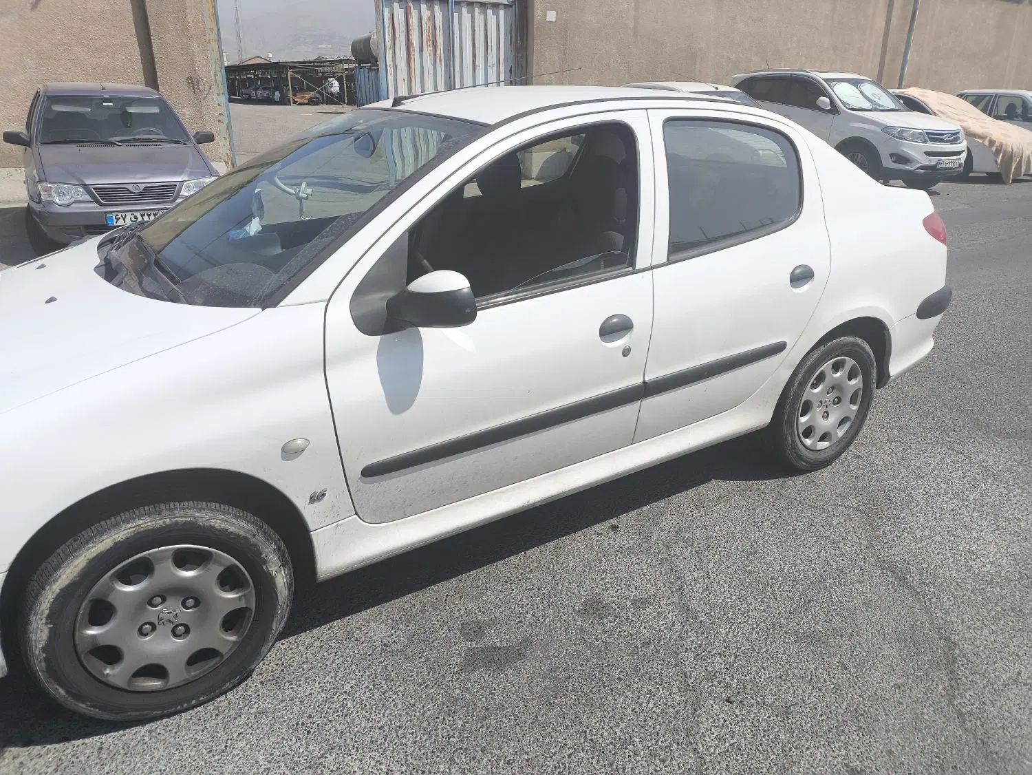 پژو ۲۰۶ صندوق دار v8 - 1399