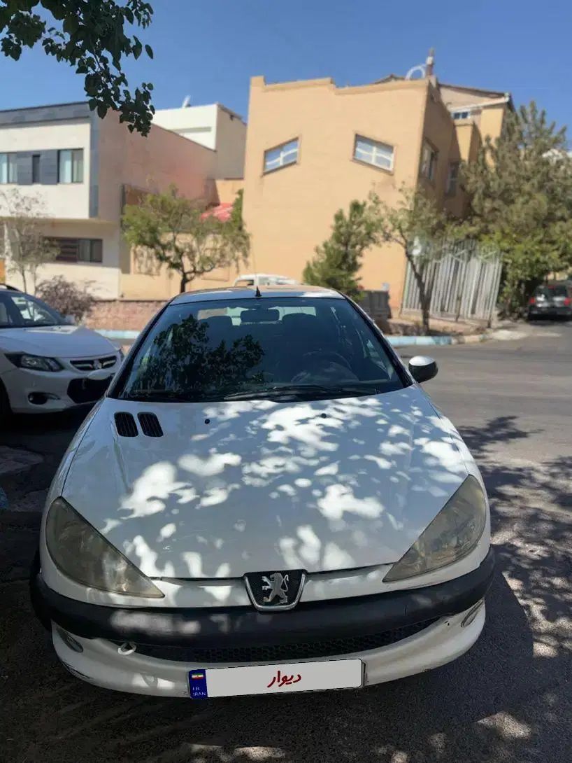 پژو ۲۰۶ صندوق دار v8 - 1396