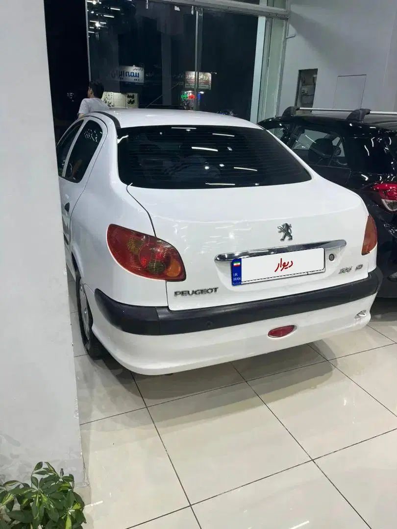 پژو ۲۰۶ صندوق دار v8 - 1393