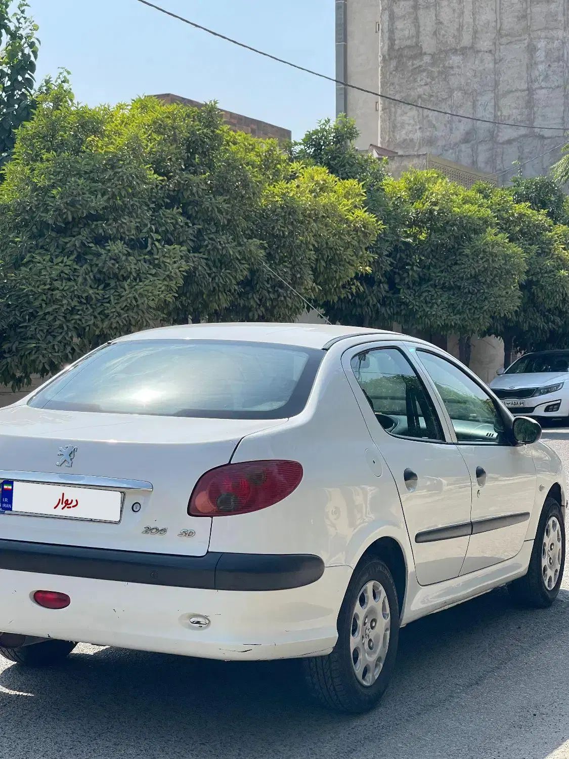 پژو ۲۰۶ صندوق دار v8 - 1395