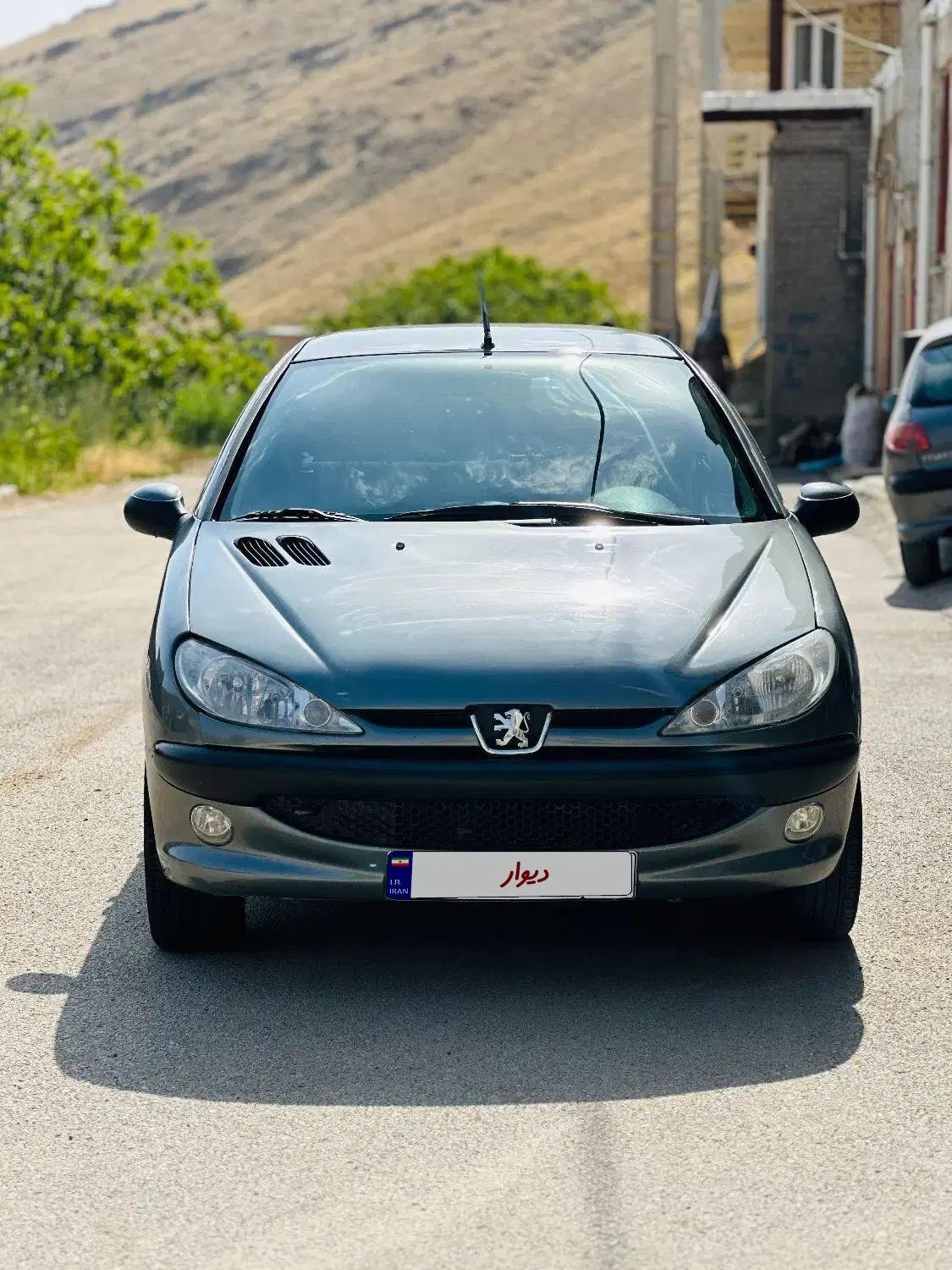 پژو ۲۰۶ صندوق دار v8 - 1397