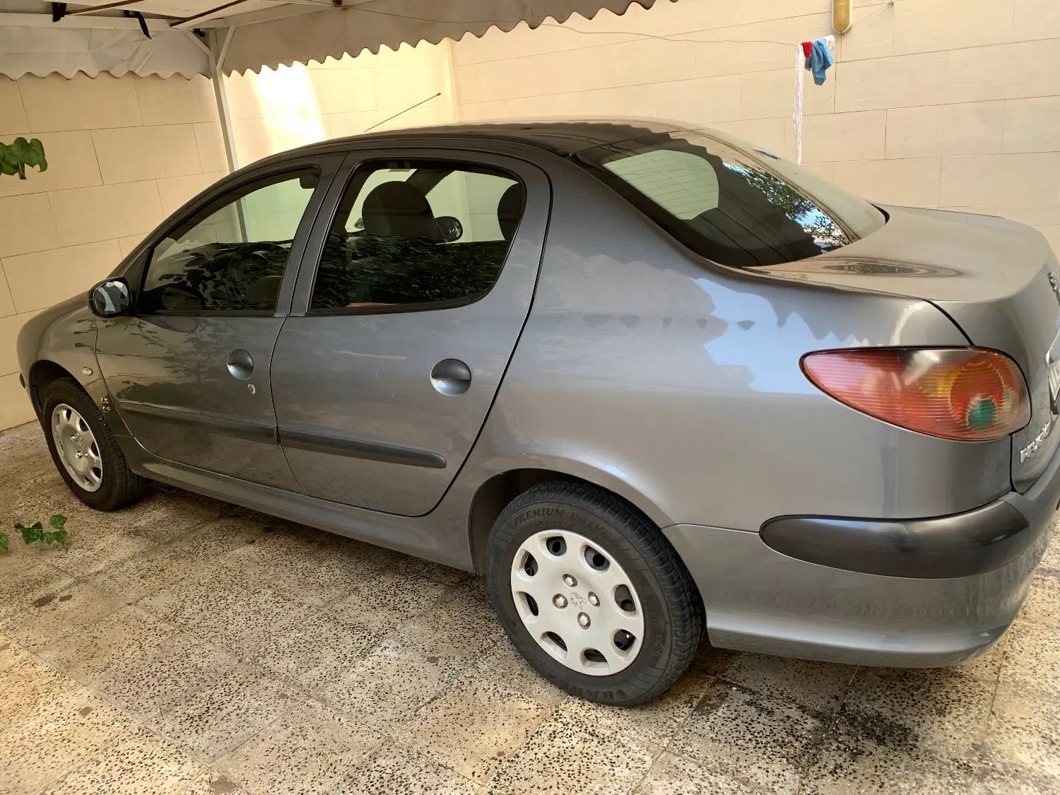 پژو ۲۰۶ صندوق دار v8 - 1394