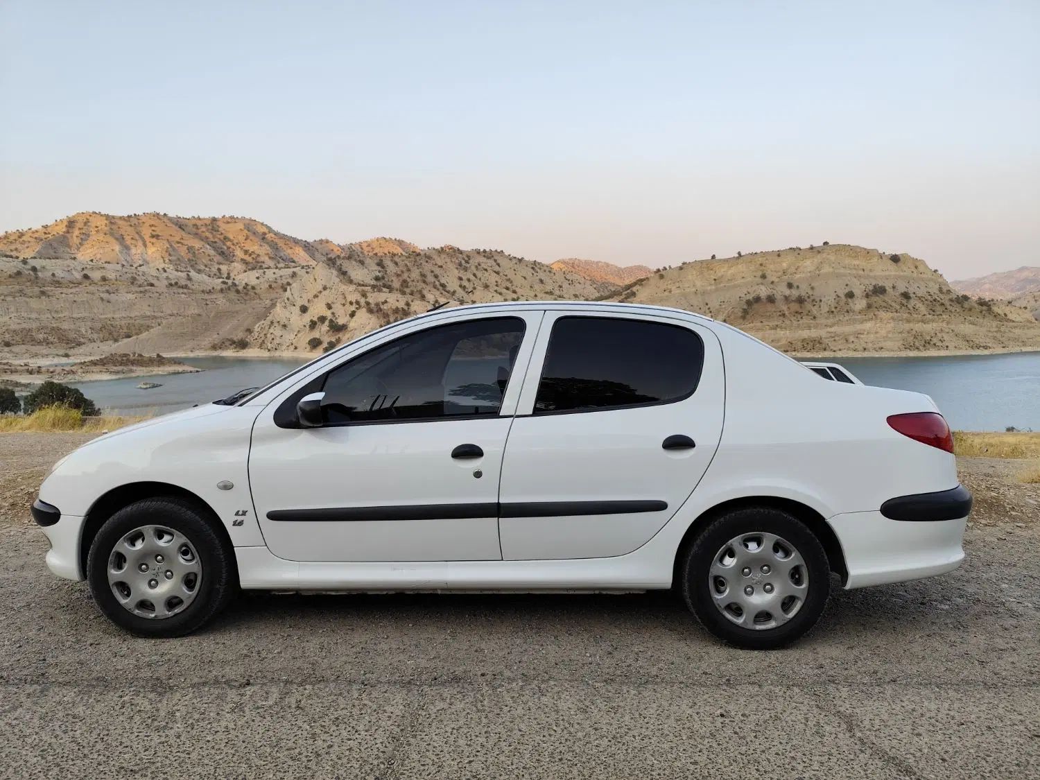 پژو ۲۰۶ صندوق دار v8 - 1396