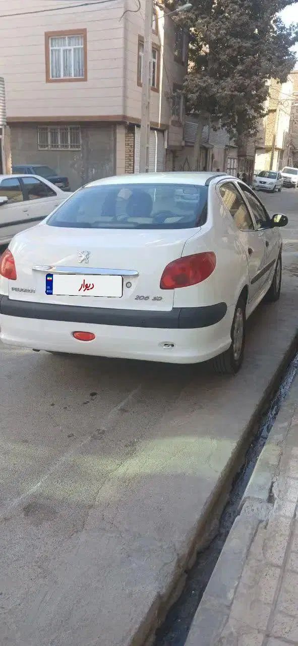 پژو ۲۰۶ صندوق دار v8 - 1396