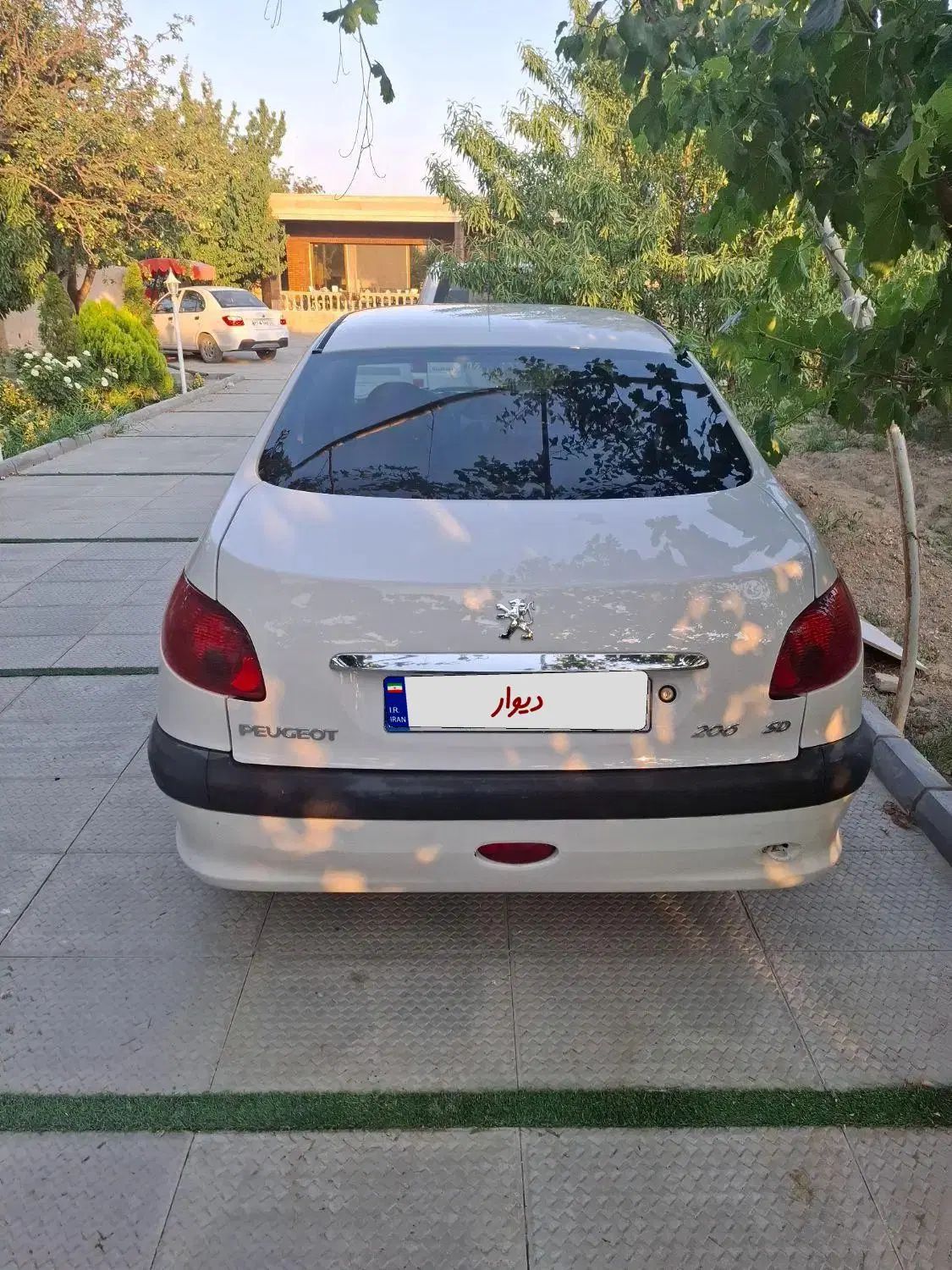پژو ۲۰۶ صندوق دار v10 - 1388