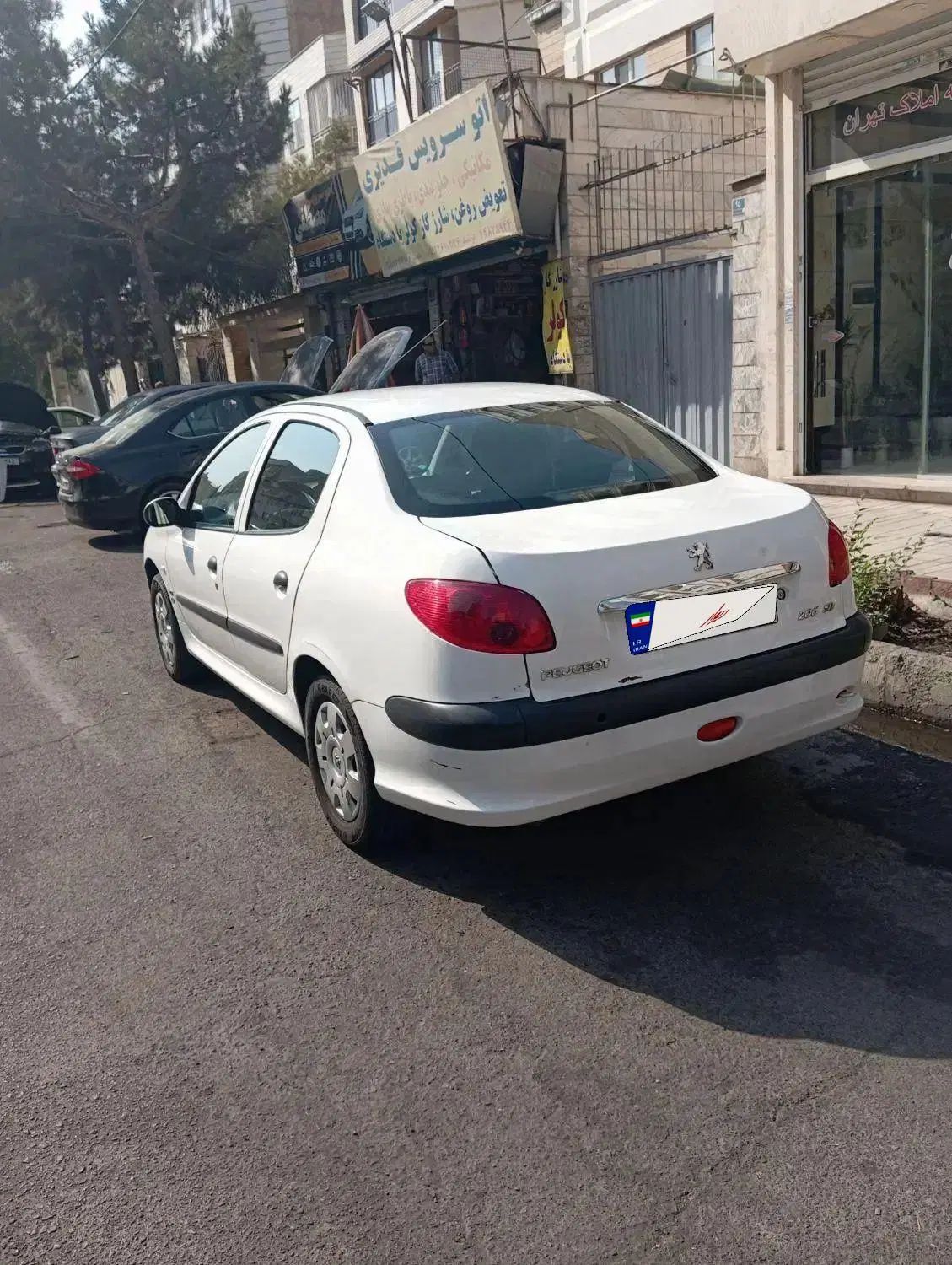 پژو ۲۰۶ صندوق دار v8 - 1396