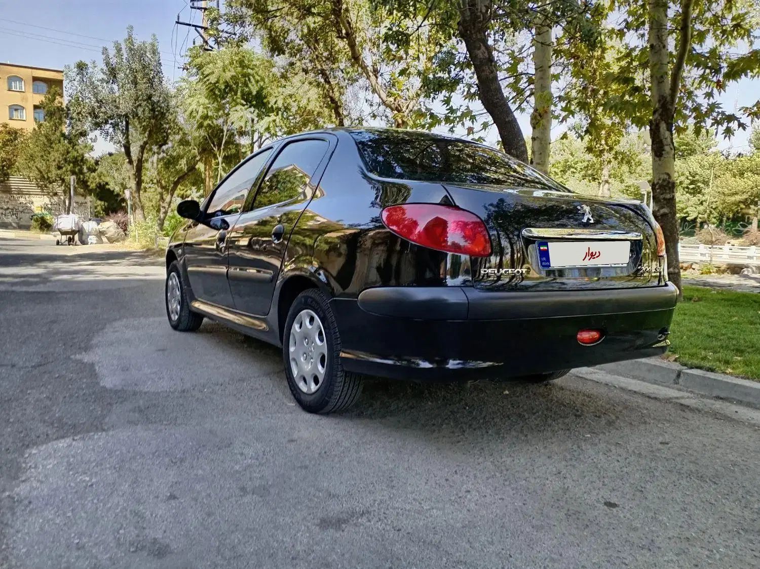 پژو ۲۰۶ صندوق دار v8 - 1400