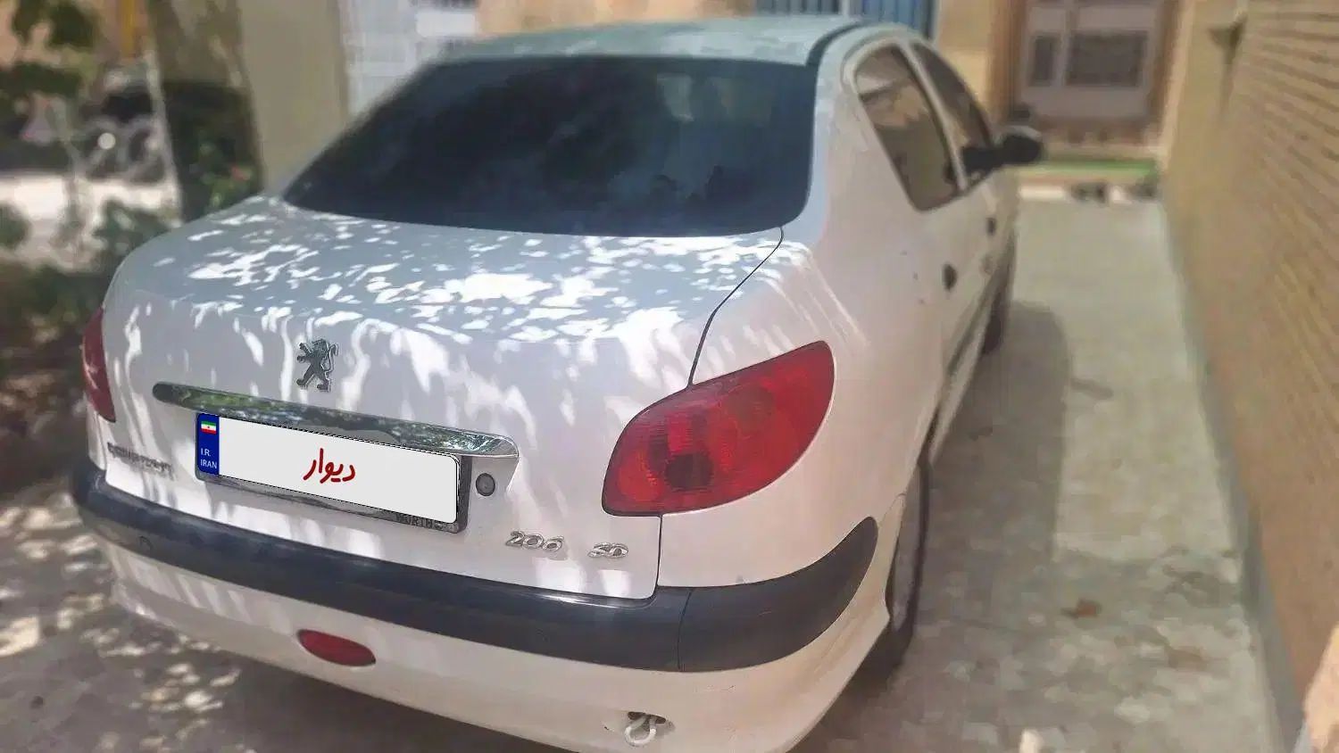 پژو ۲۰۶ صندوق دار v8 - 1397