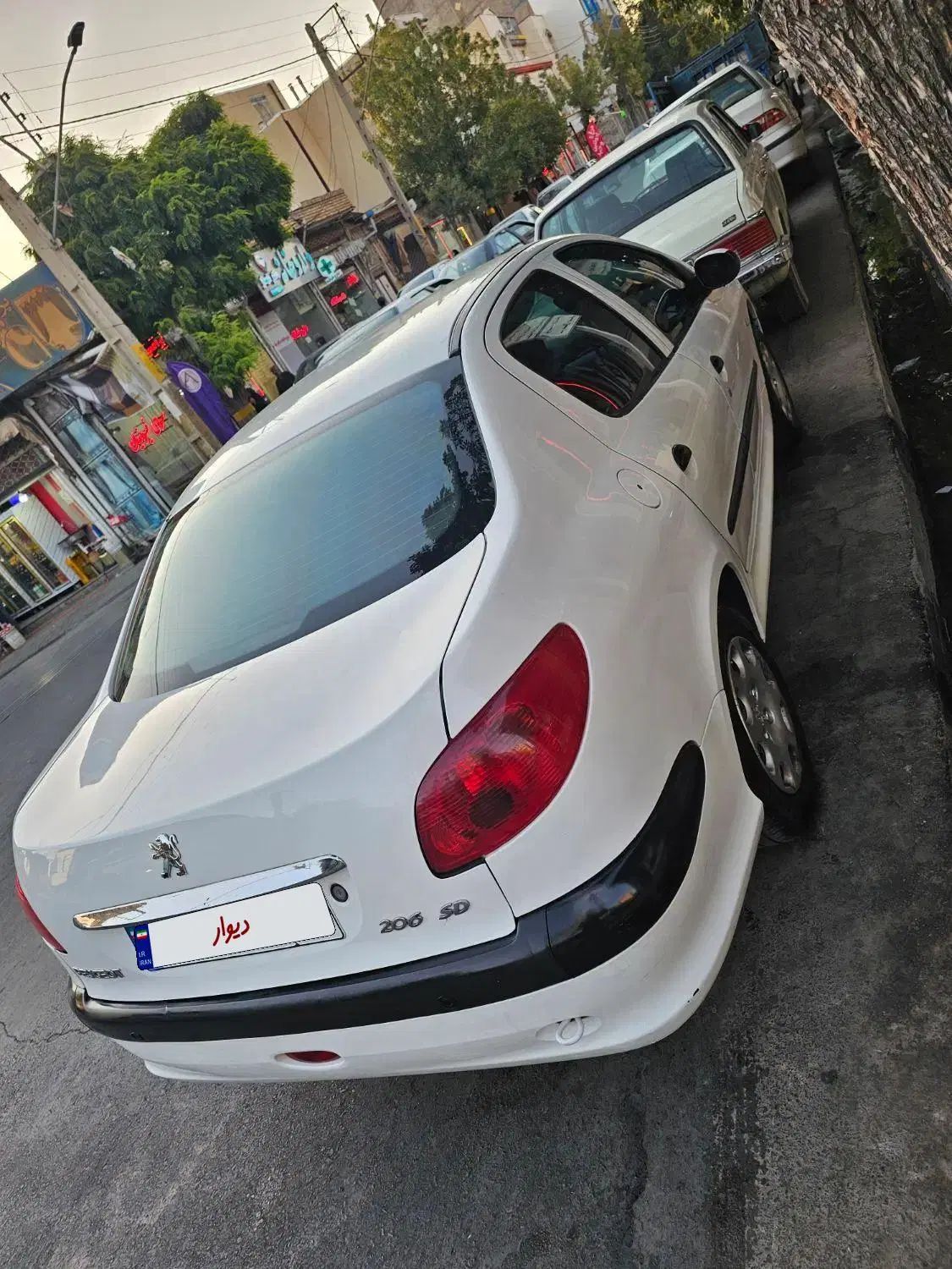 پژو ۲۰۶ صندوق دار v8 - 1396