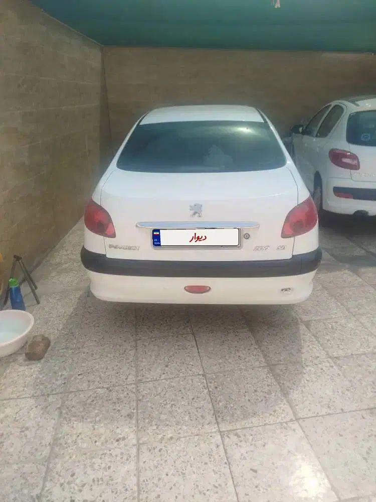 پژو ۲۰۶ صندوق دار v8 - 1397