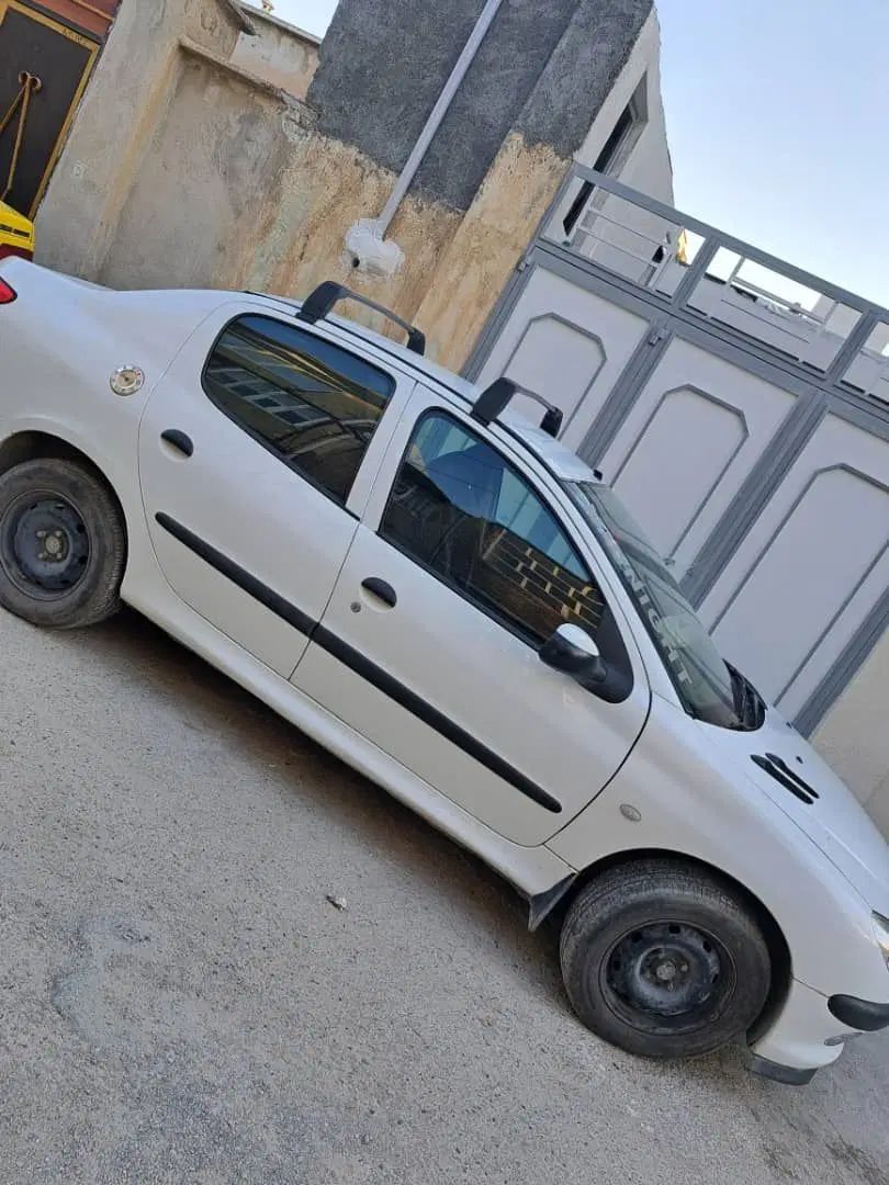 پژو ۲۰۶ صندوق دار v8 - 1391