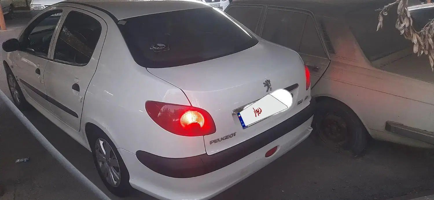 پژو ۲۰۶ صندوق دار v8 - 1395