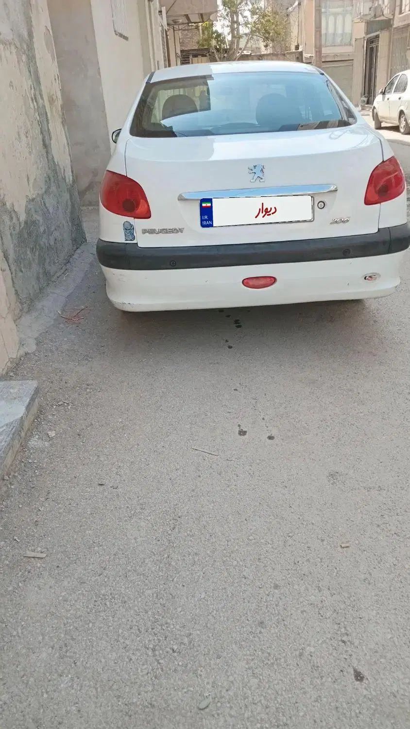 پژو ۲۰۶ صندوق دار v8 - 1395