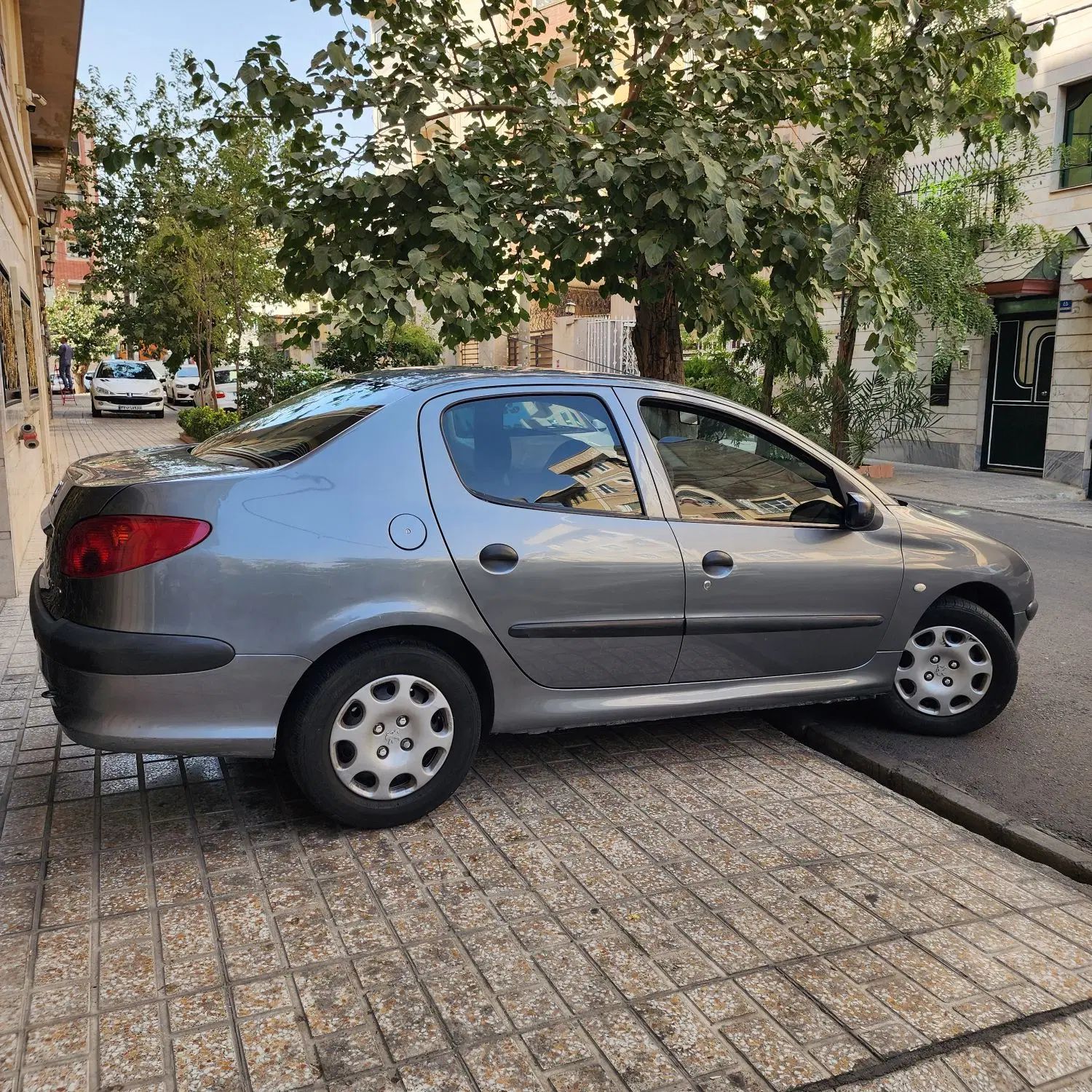 پژو ۲۰۶ صندوق دار v8 - 1394