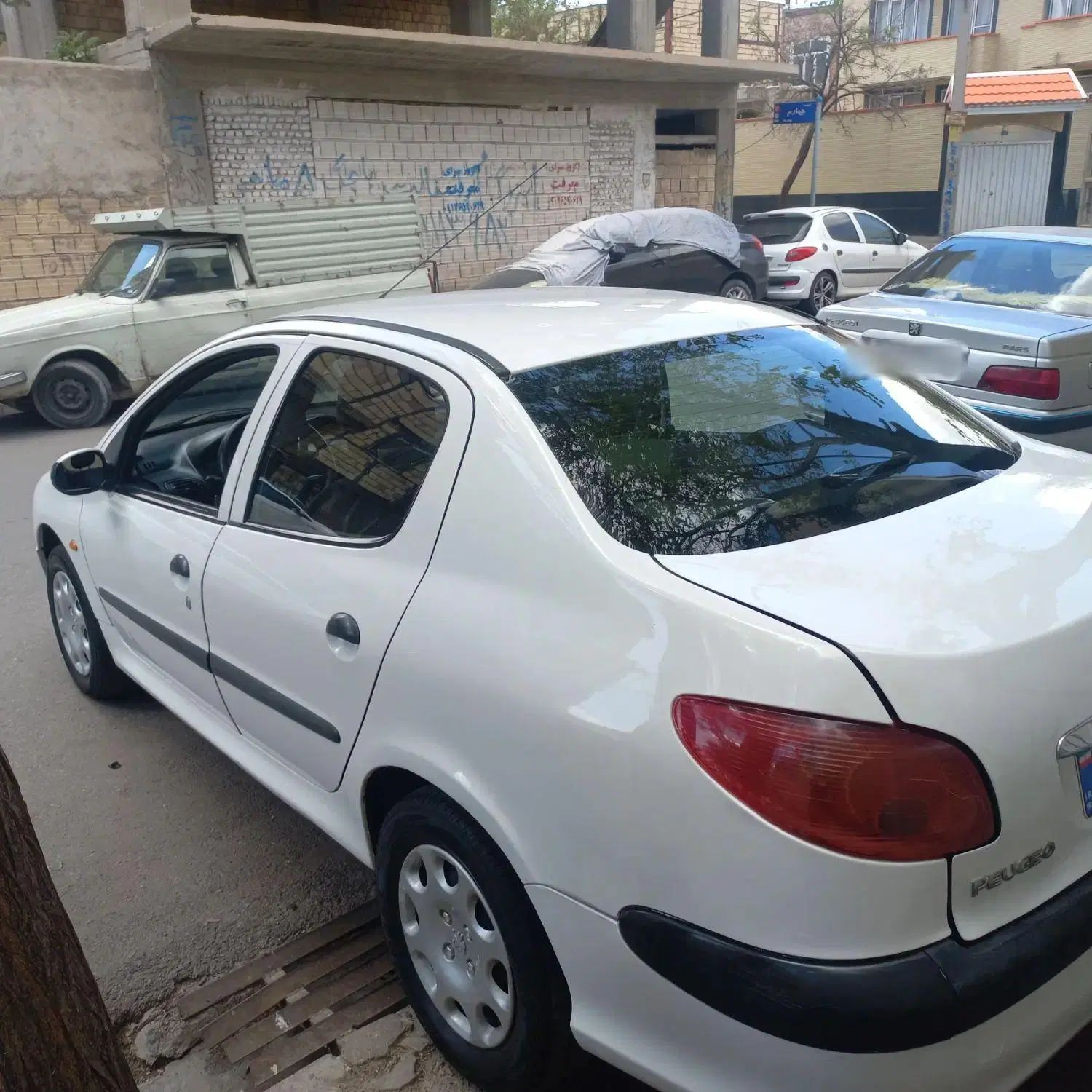 پژو ۲۰۶ صندوق دار v8 - 1394