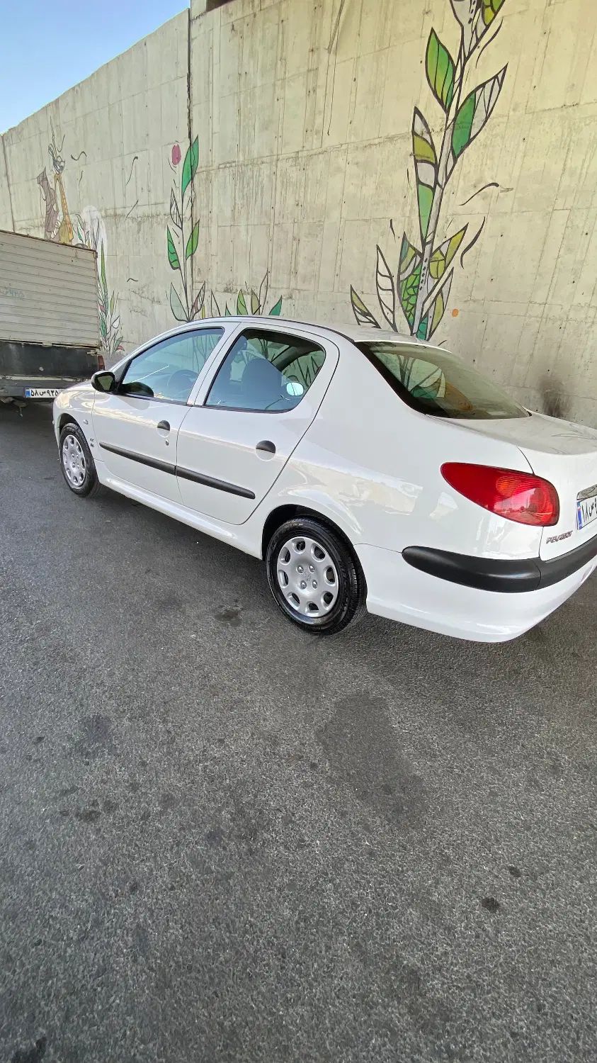 پژو ۲۰۶ صندوق دار v8 - 1395