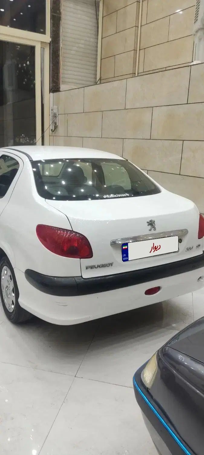 پژو ۲۰۶ صندوق دار v8 - 1395