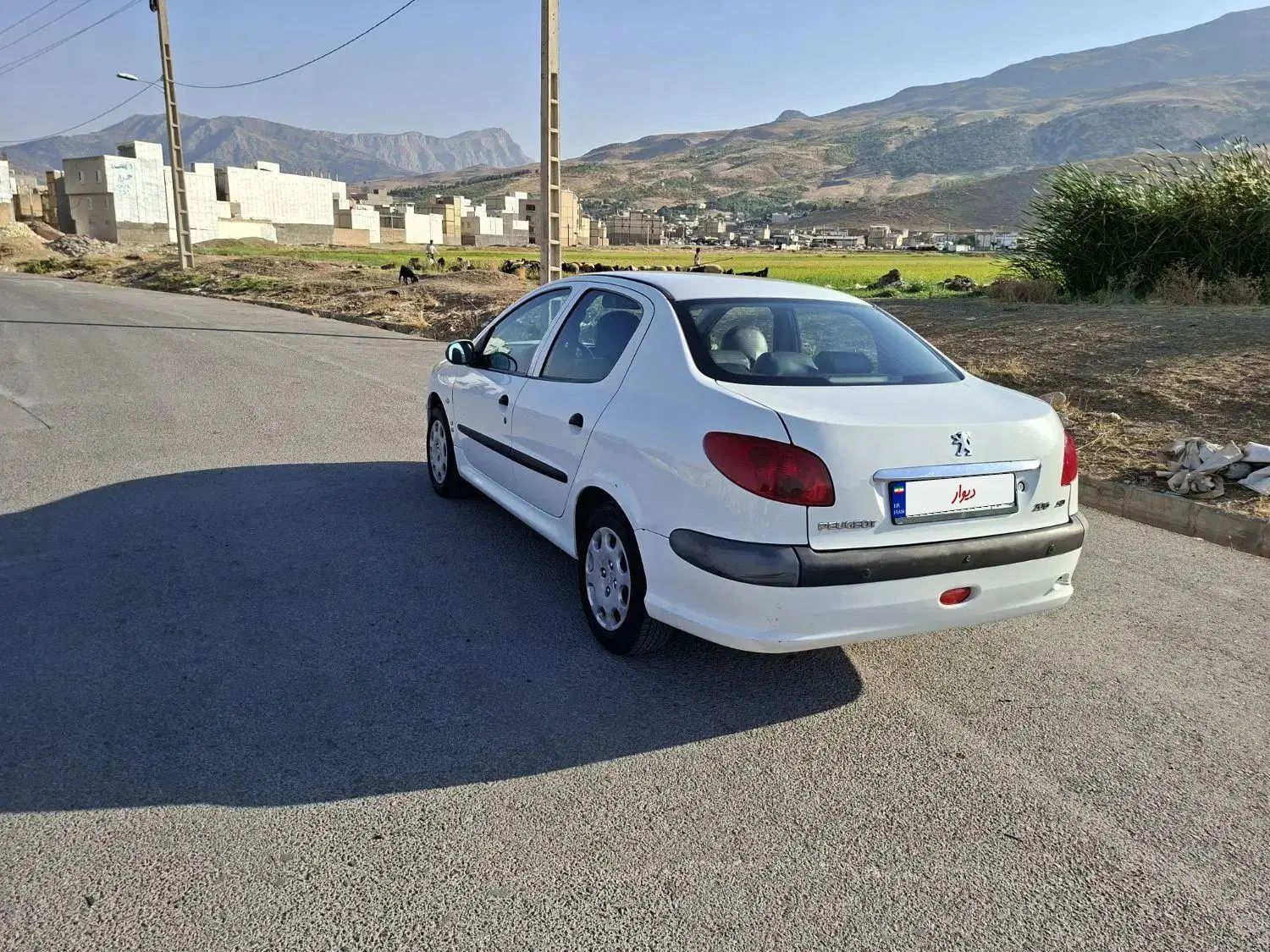 پژو ۲۰۶ صندوق دار v8 - 1394