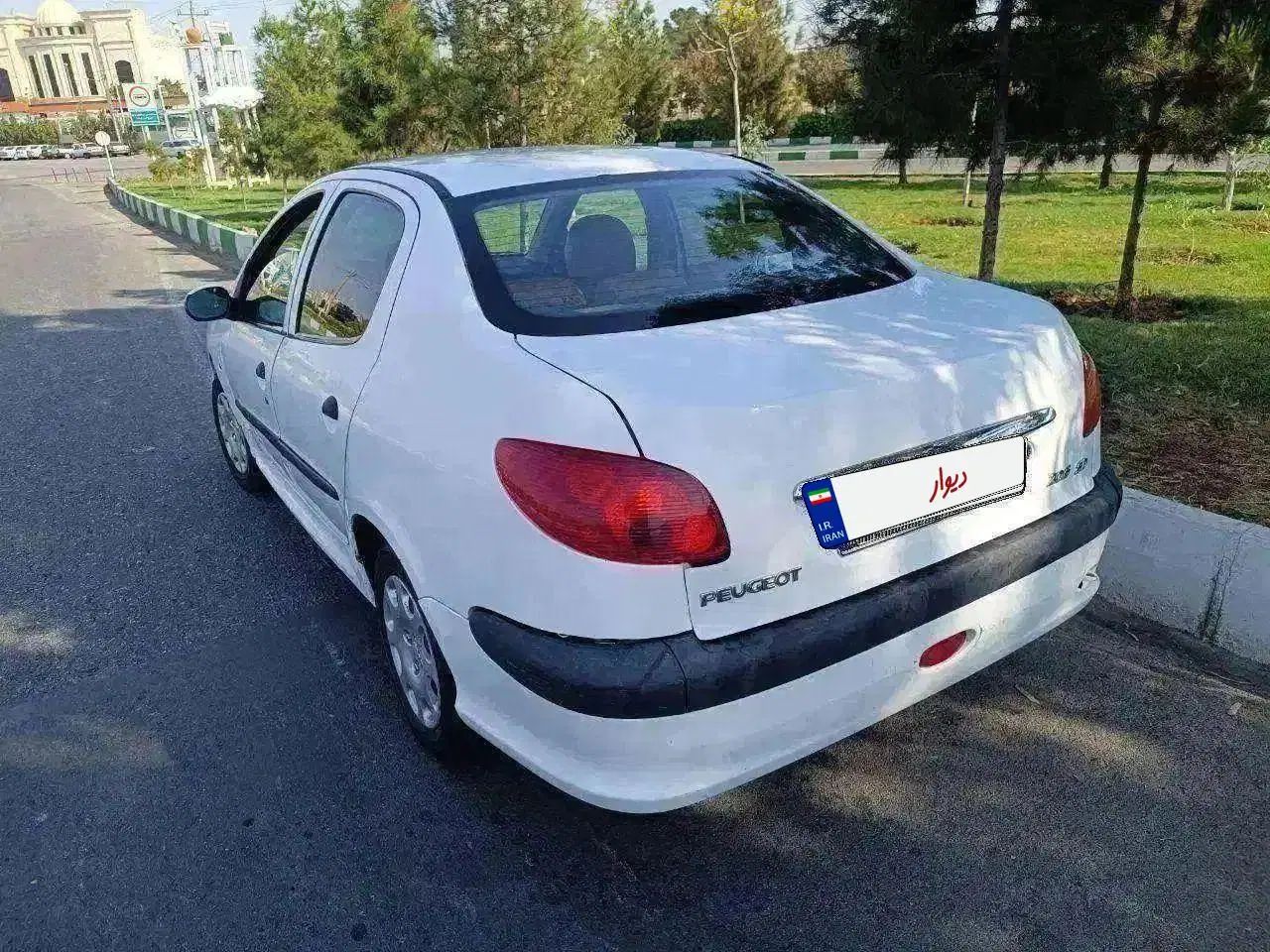 پژو ۲۰۶ صندوق دار v8 - 1391