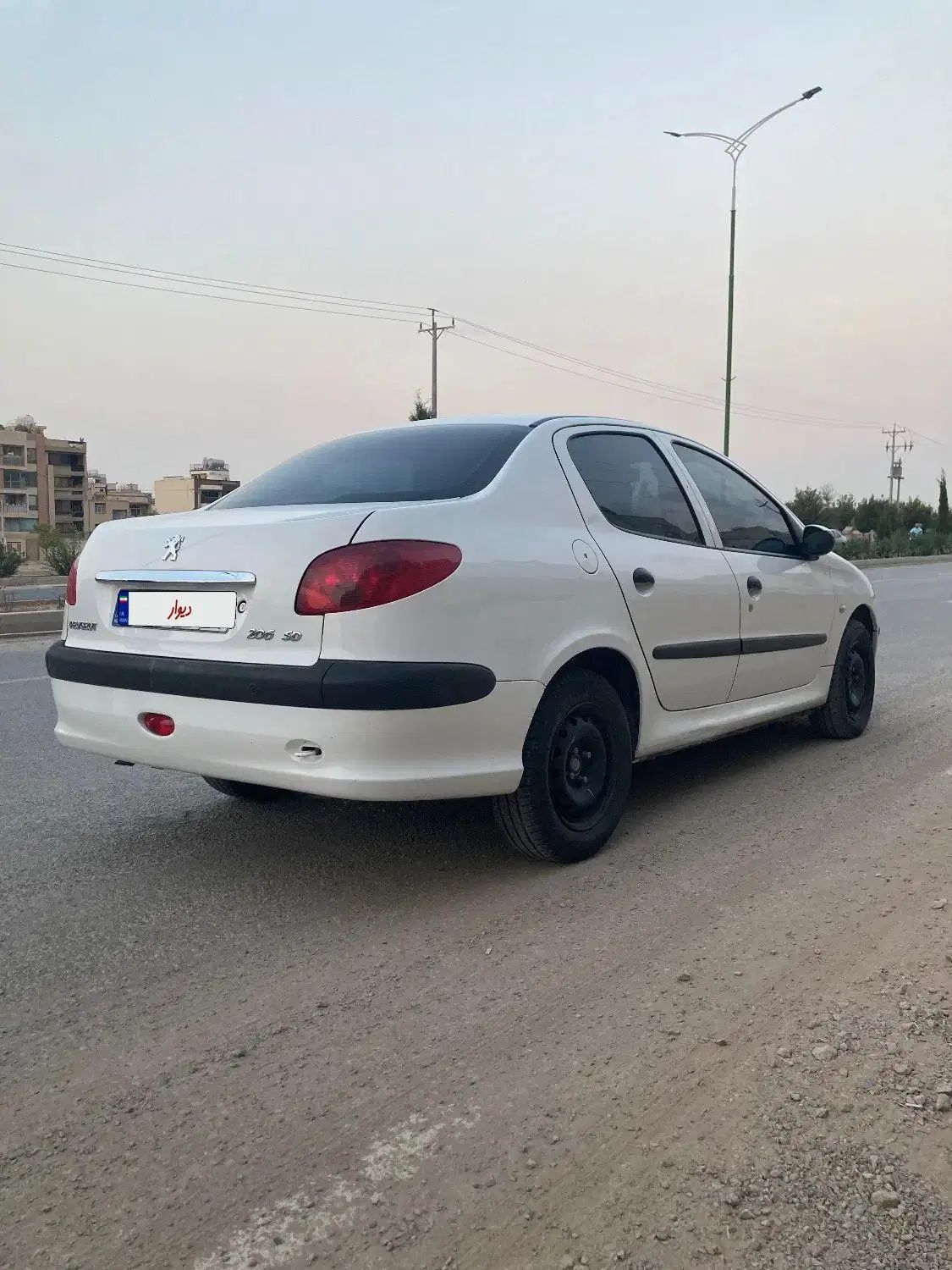 پژو ۲۰۶ صندوق دار v8 - 1396