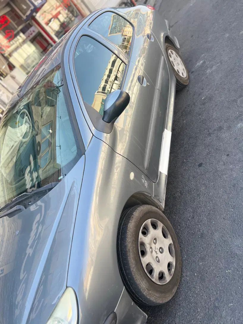 پژو ۲۰۶ صندوق دار v8 - 1399