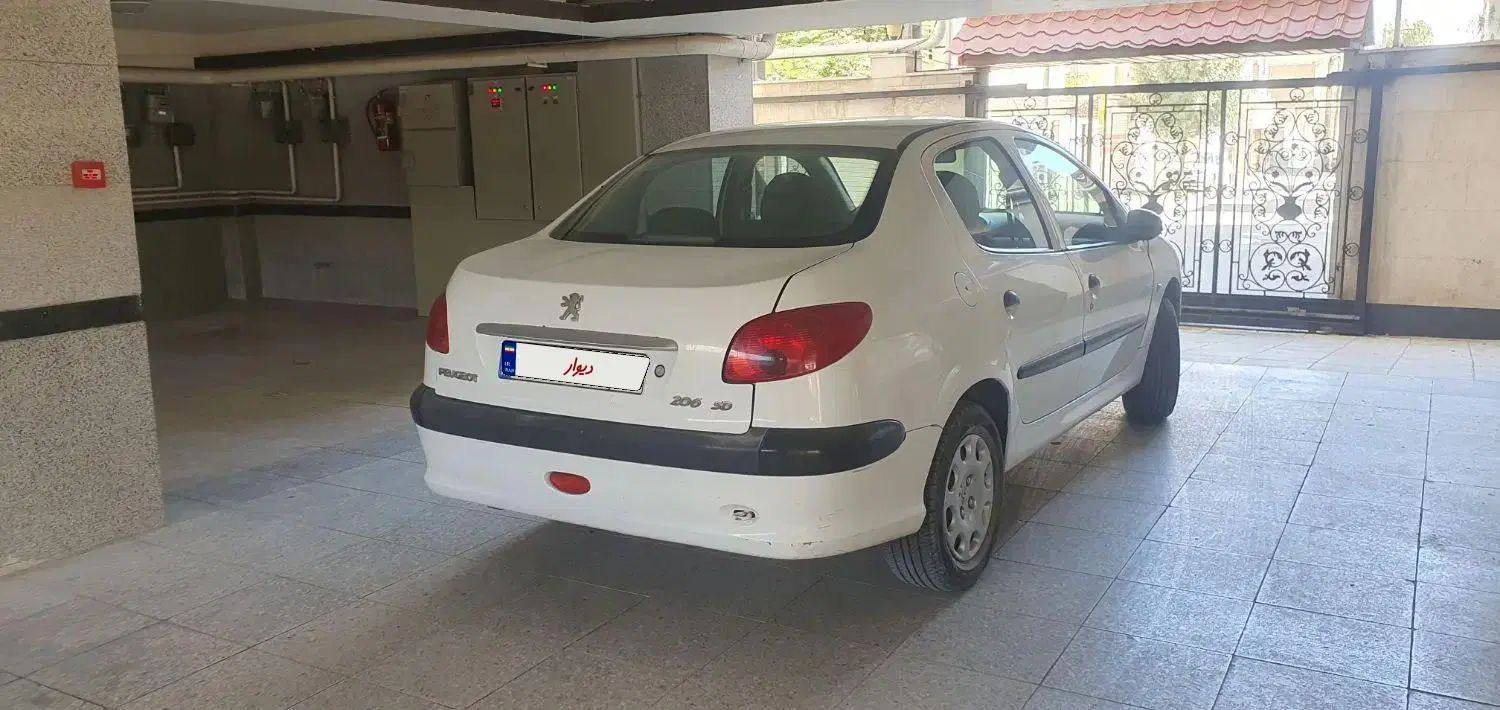 پژو ۲۰۶ صندوق دار v8 - 1391