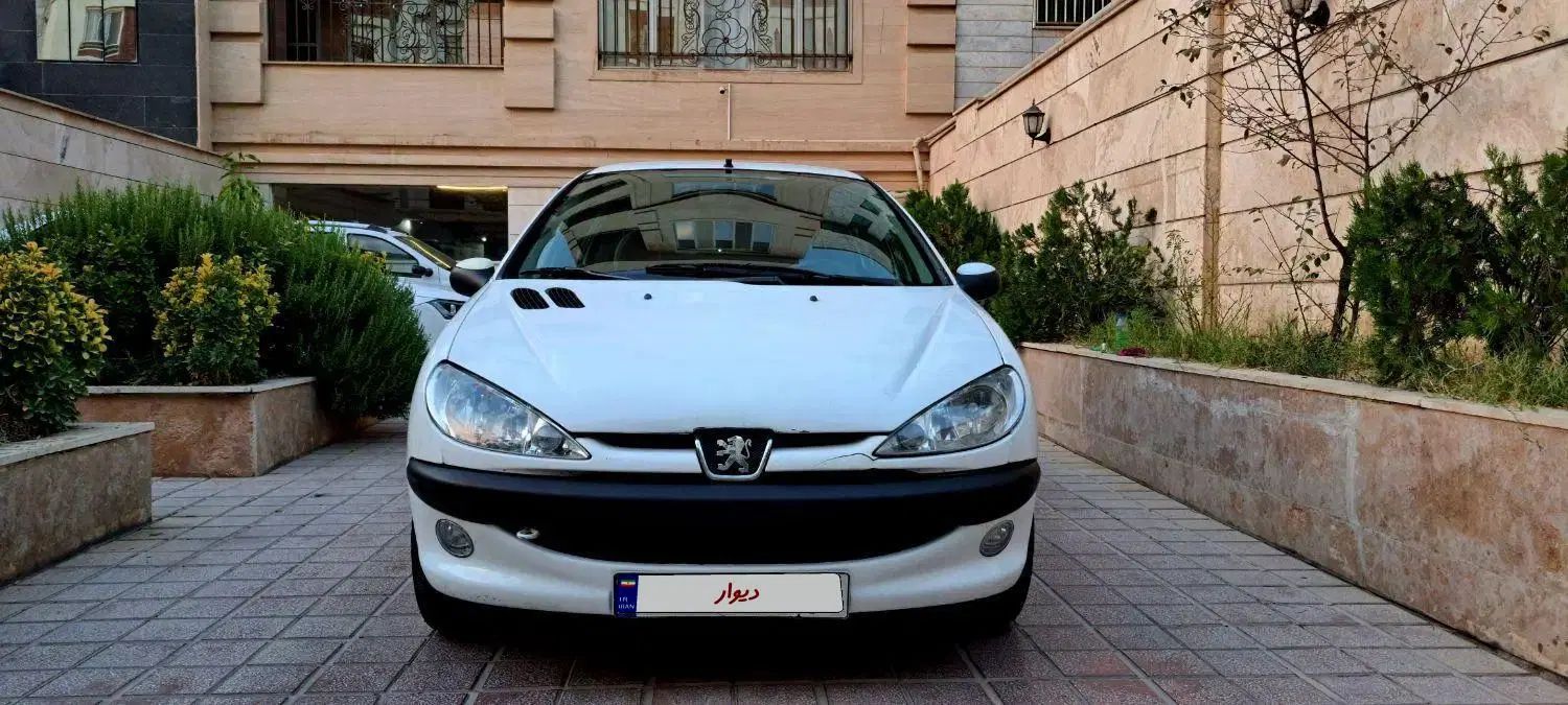 پژو ۲۰۶ صندوق دار v8 - 1394