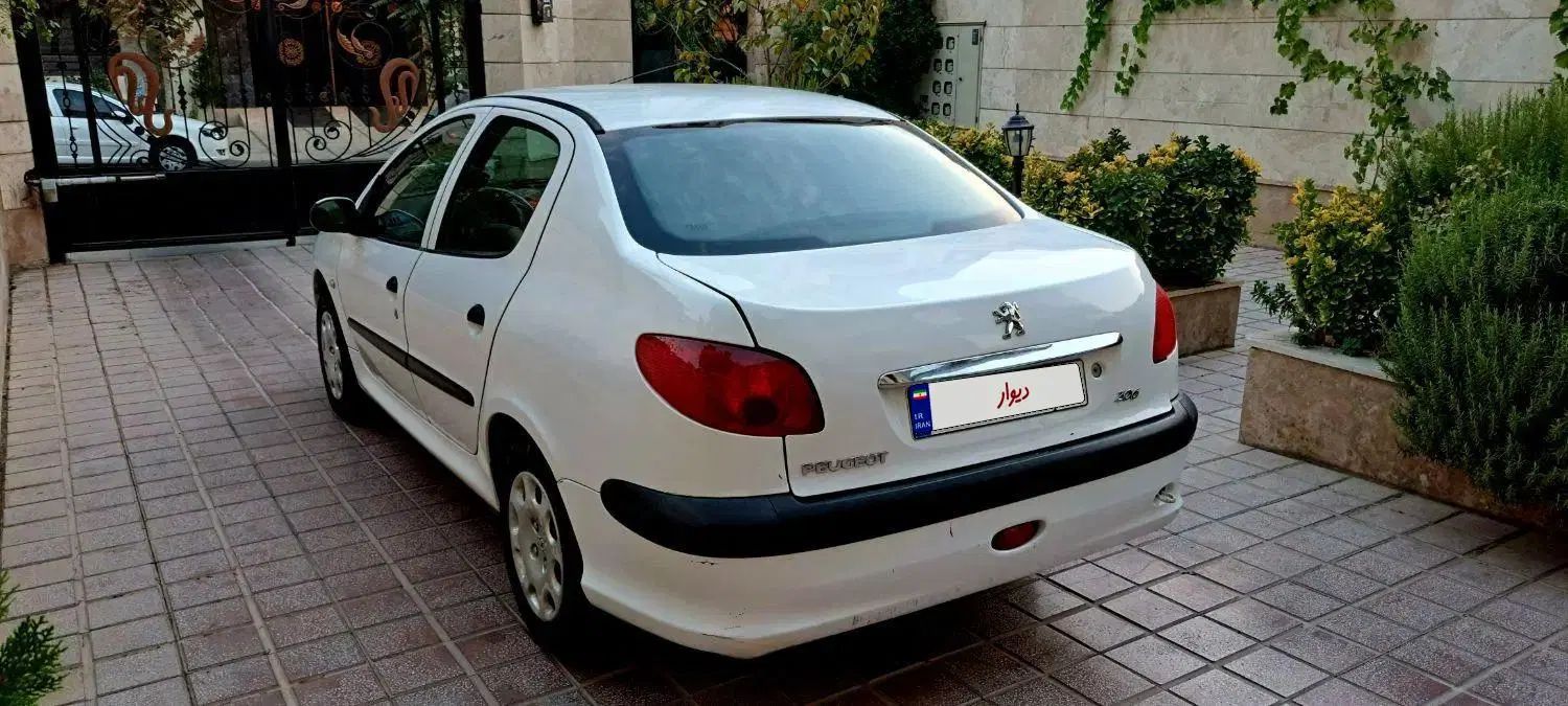 پژو ۲۰۶ صندوق دار v8 - 1394