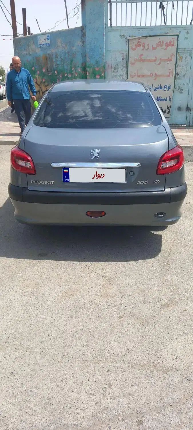 پژو ۲۰۶ صندوق دار v8 - 1394