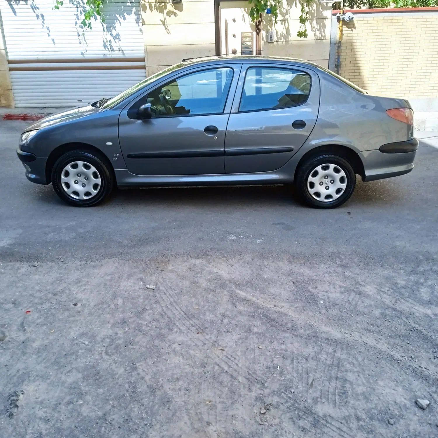 پژو ۲۰۶ صندوق دار v8 - 1396