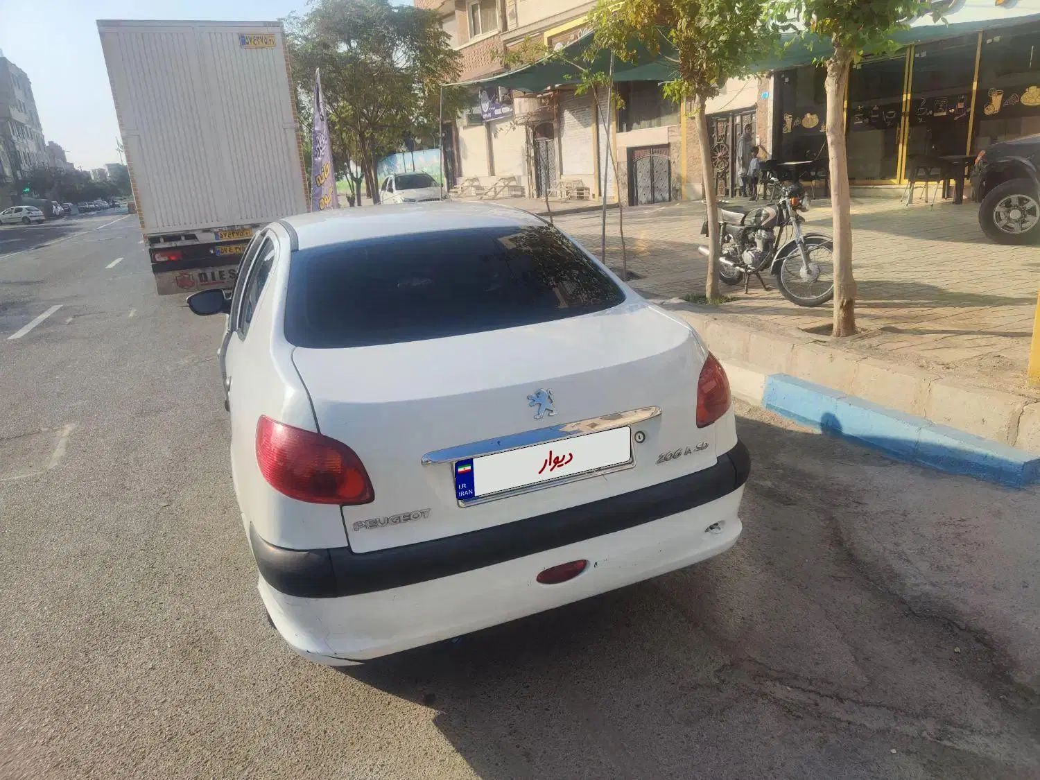 پژو ۲۰۶ صندوق دار v9 - 1386