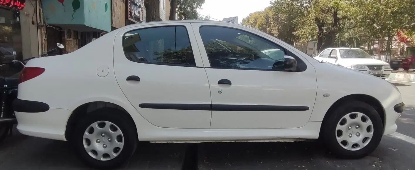 پژو ۲۰۶ صندوق دار v8 - 1395