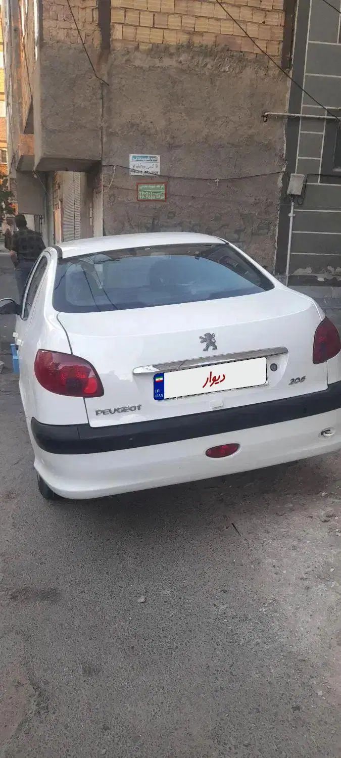 پژو ۲۰۶ صندوق دار v8 - 1396