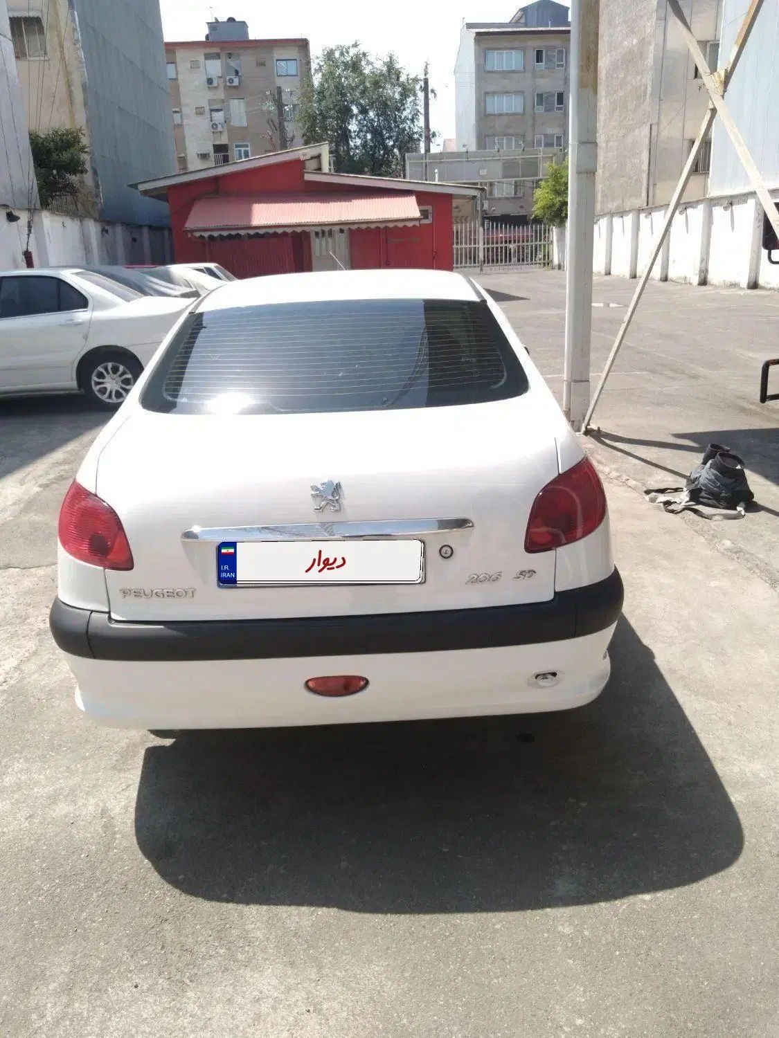 پژو ۲۰۶ صندوق دار v8 - 1396