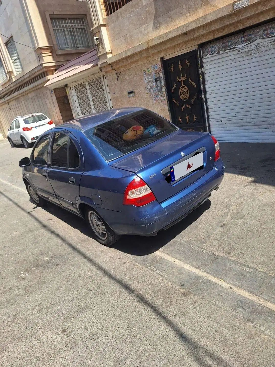 تیبا صندوق دار SX - 1392
