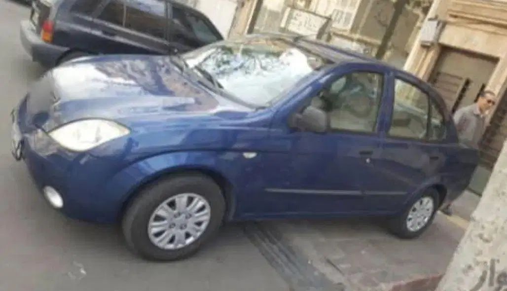 تیبا صندوق دار SX - 1391