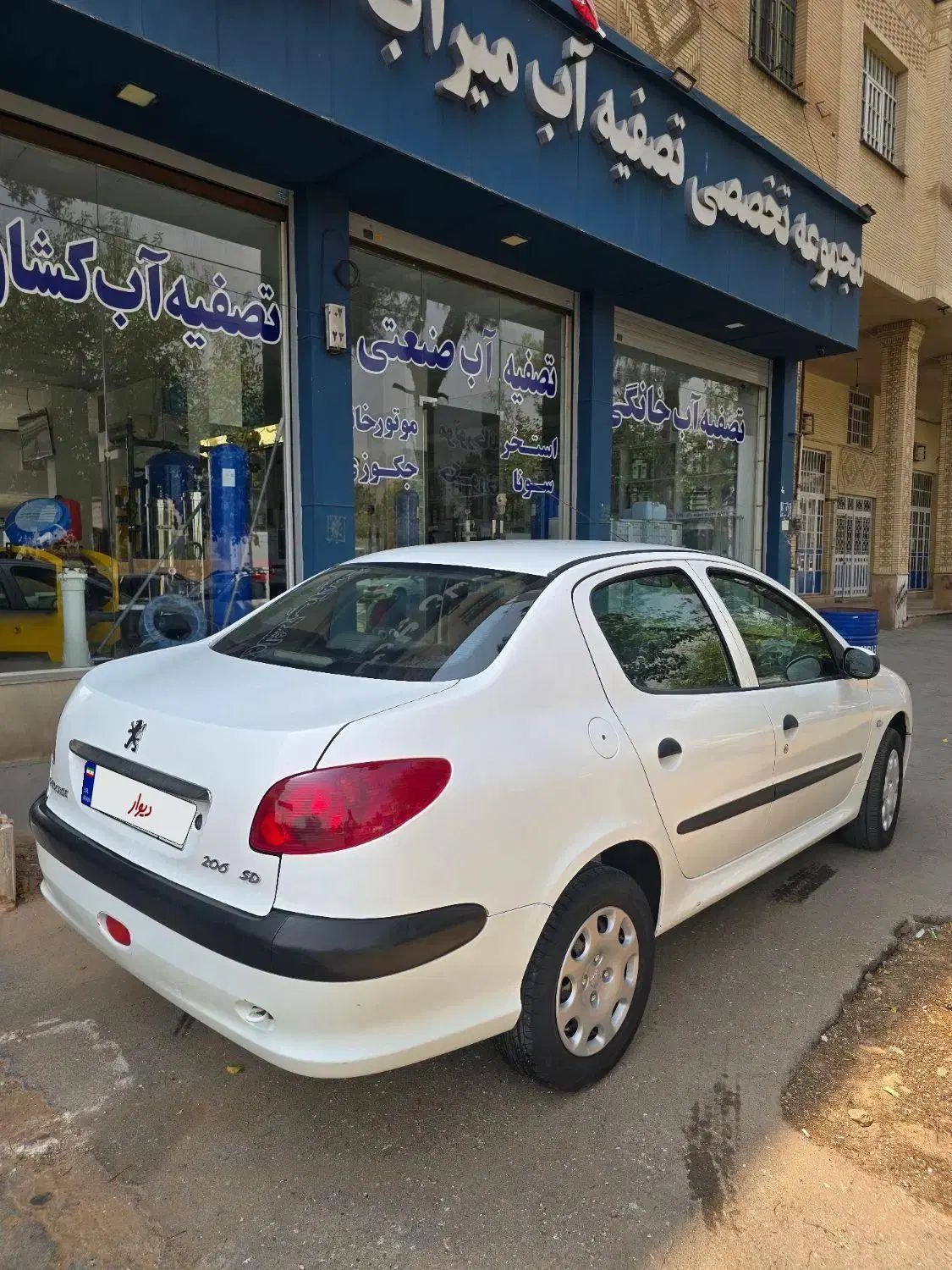 پژو ۲۰۶ صندوق دار v6 - 1390