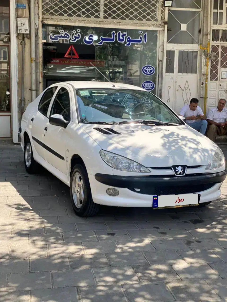 پژو ۲۰۶ صندوق دار v8 - 1399
