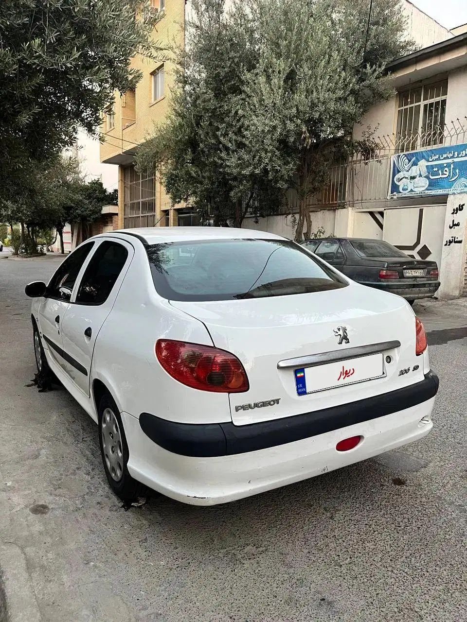 پژو ۲۰۶ صندوق دار v8 - 1392