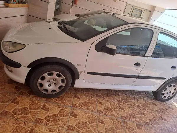 پژو ۲۰۶ صندوق دار v8 - 1394