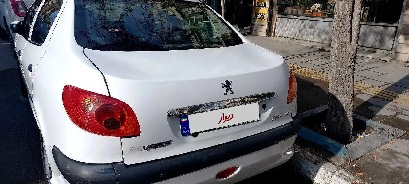 پژو ۲۰۶ صندوق دار v8 - 1393
