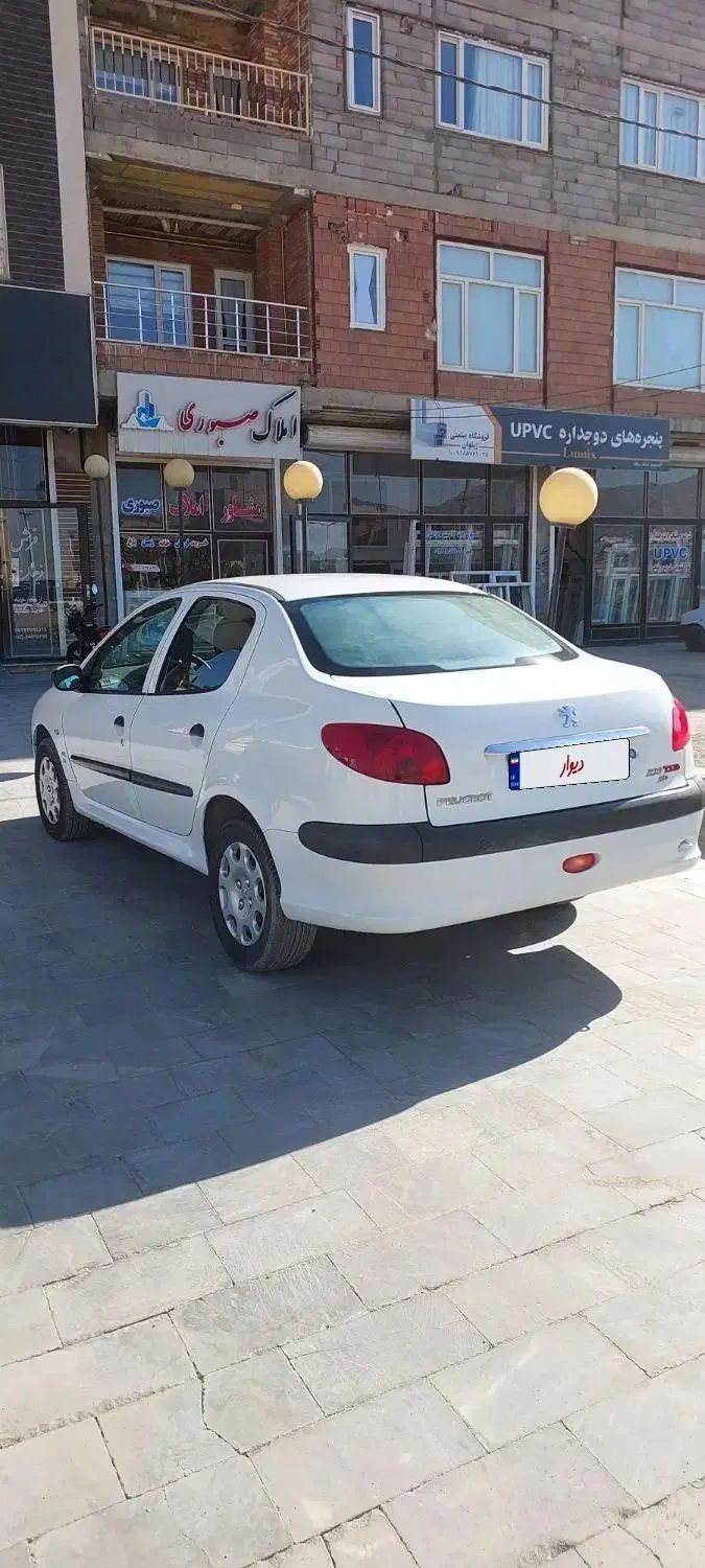 پژو ۲۰۶ صندوق دار v8 - 1393