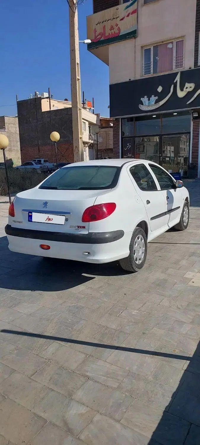 پژو ۲۰۶ صندوق دار v8 - 1393