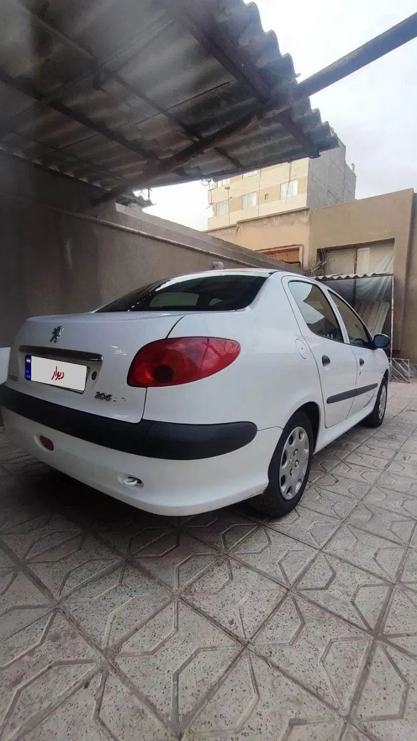پژو ۲۰۶ صندوق دار v8 - 1396