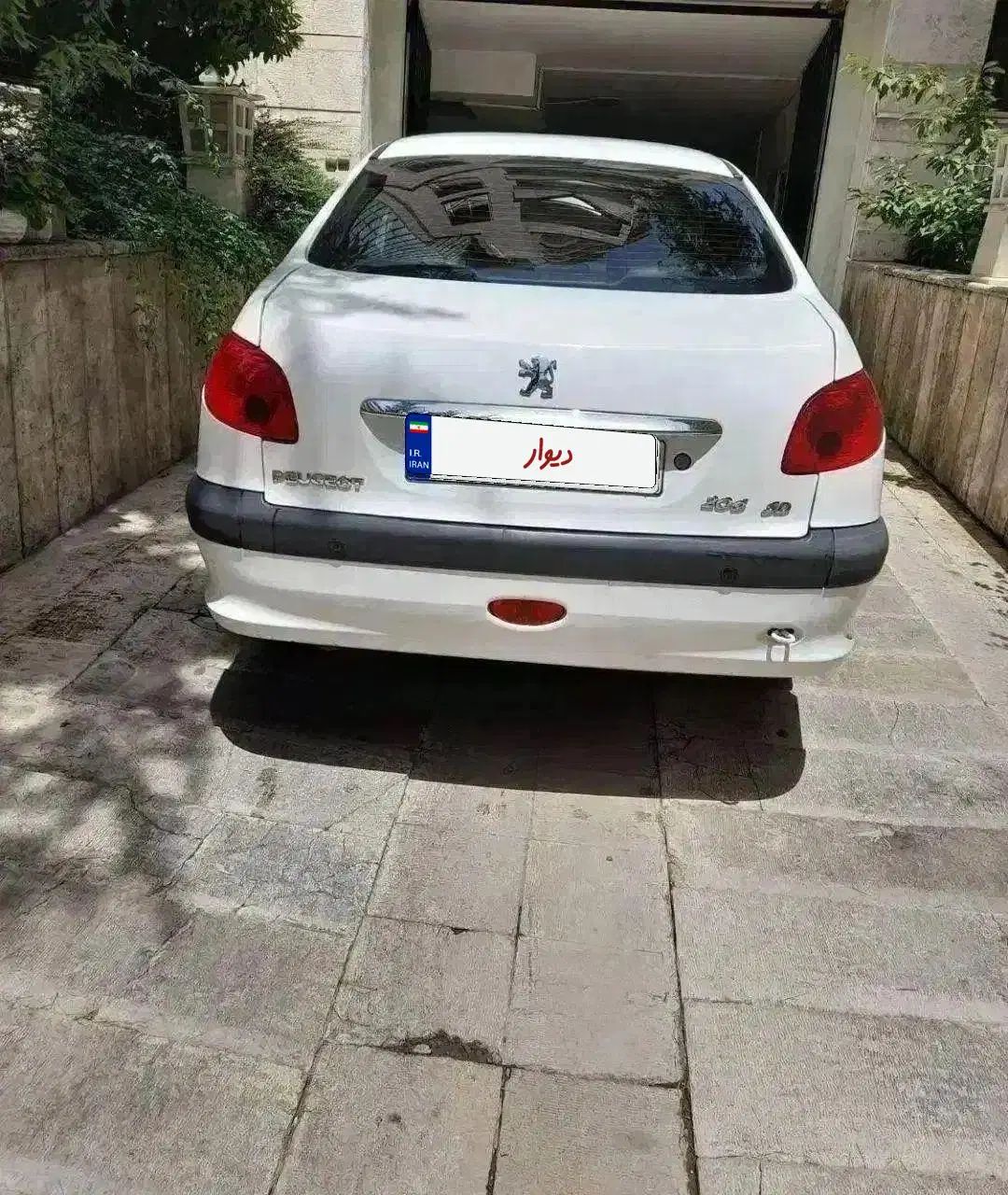 پژو ۲۰۶ صندوق دار v8 - 1391