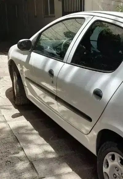 پژو ۲۰۶ صندوق دار v8 - 1391