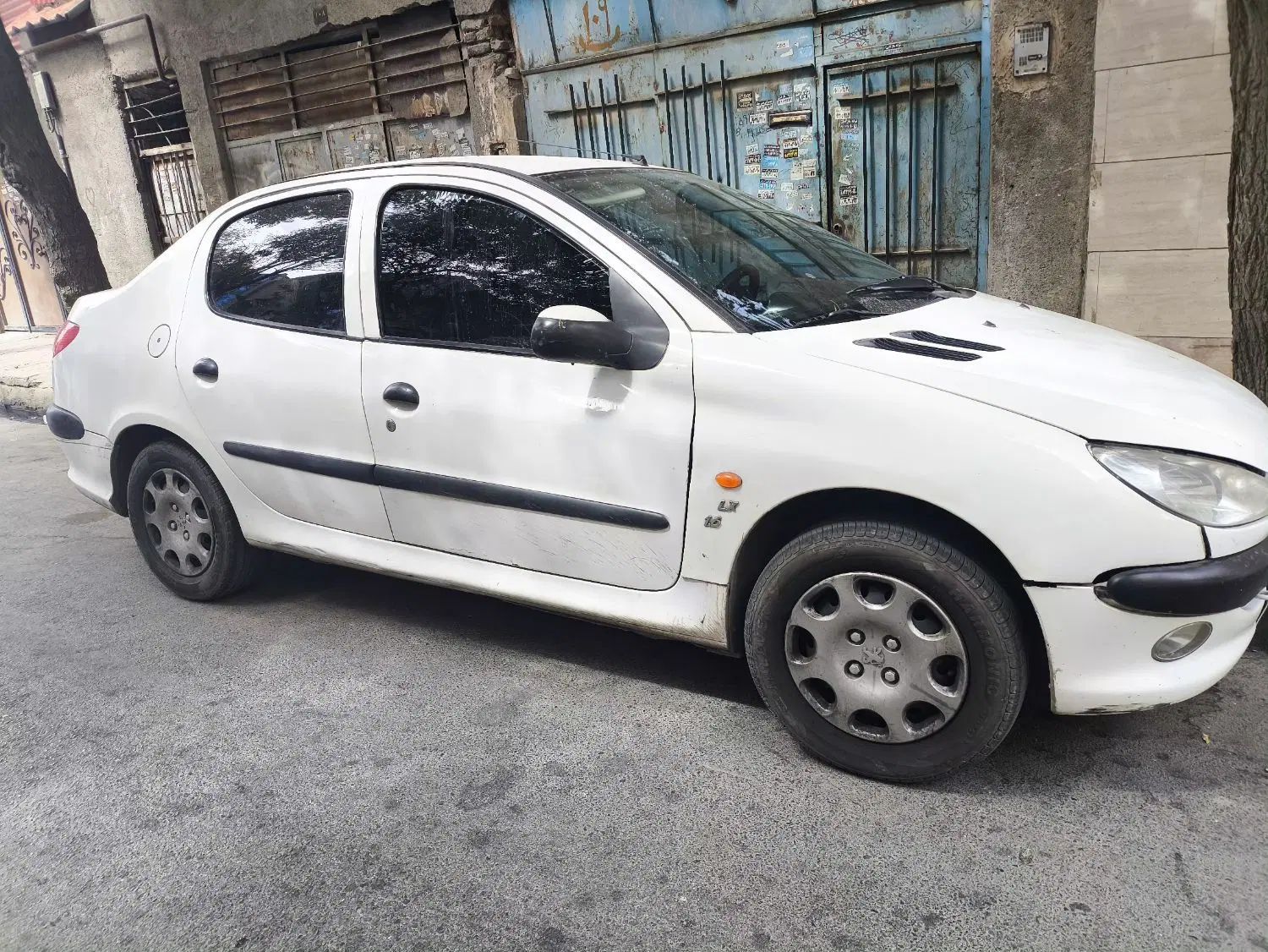 پژو ۲۰۶ صندوق دار v8 - 1397