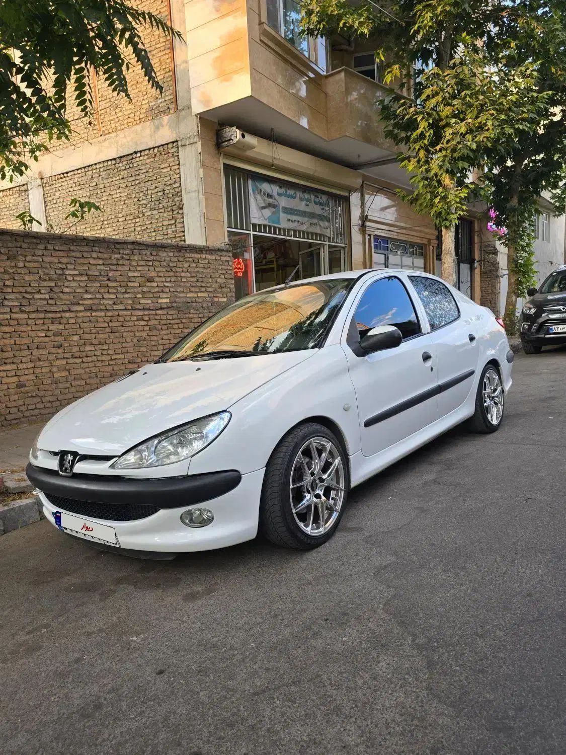 پژو ۲۰۶ صندوق دار v8 - 1397