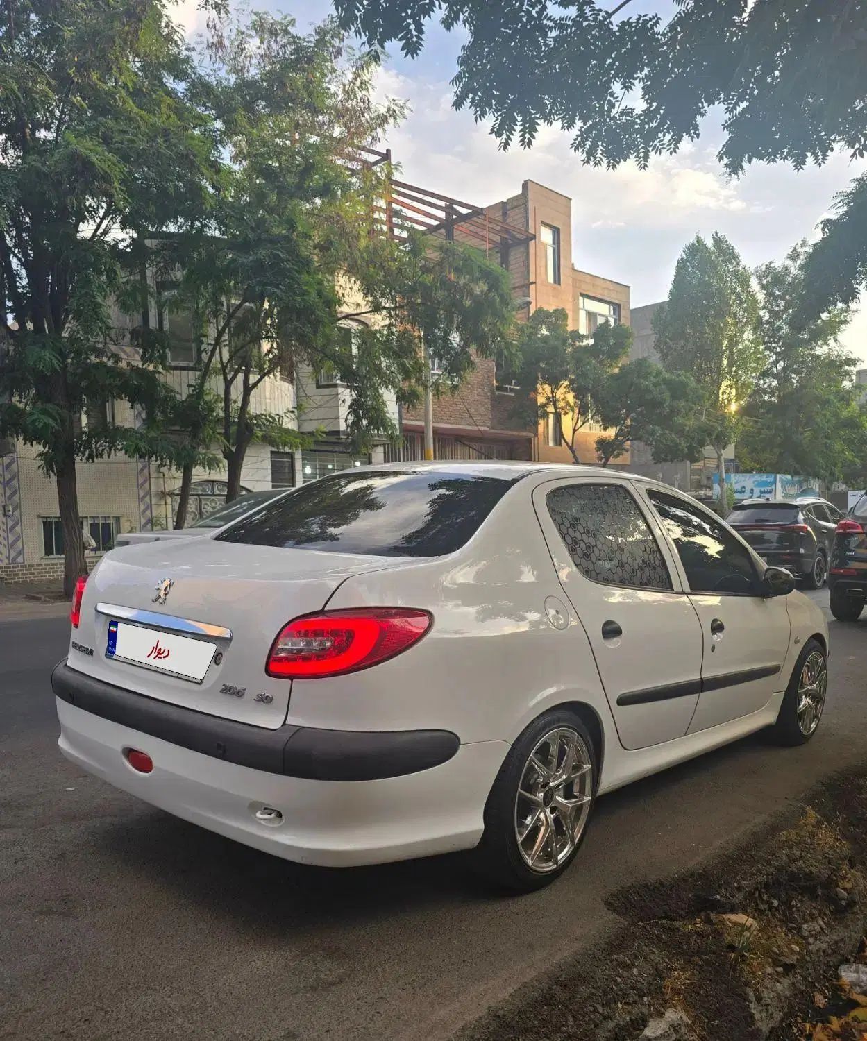 پژو ۲۰۶ صندوق دار v8 - 1397